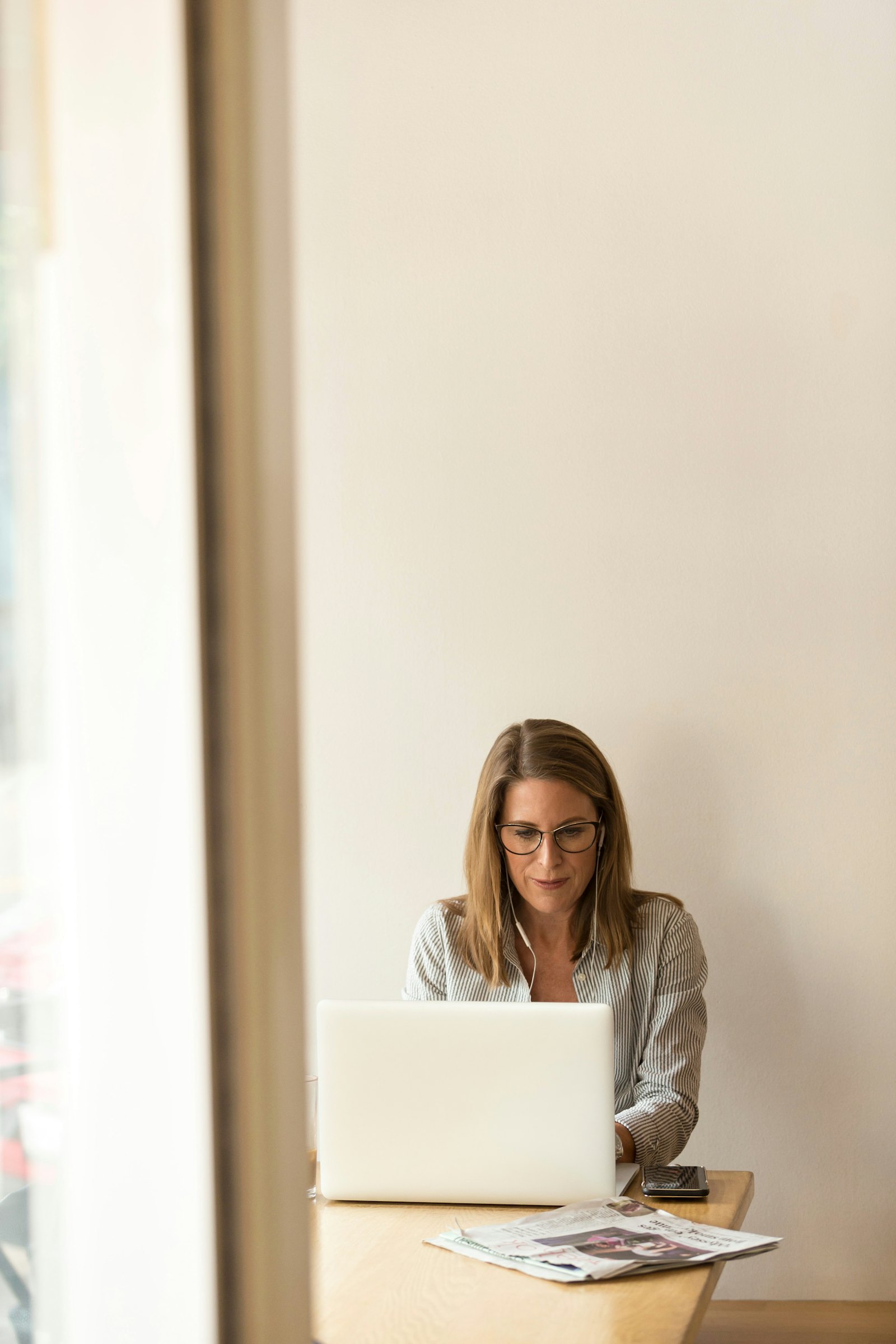 B2B SaaS growth leader working through SEO strategy at a computer